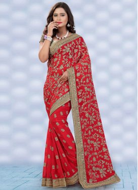 Exuberant Embroidery Work Red Color Wedding Saree