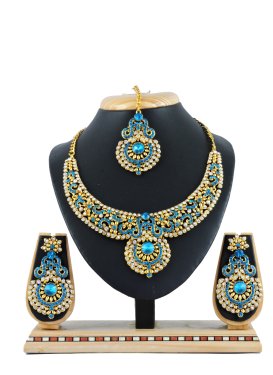 Flamboyant Stone Work Gold and Light Blue Necklace Set for Party