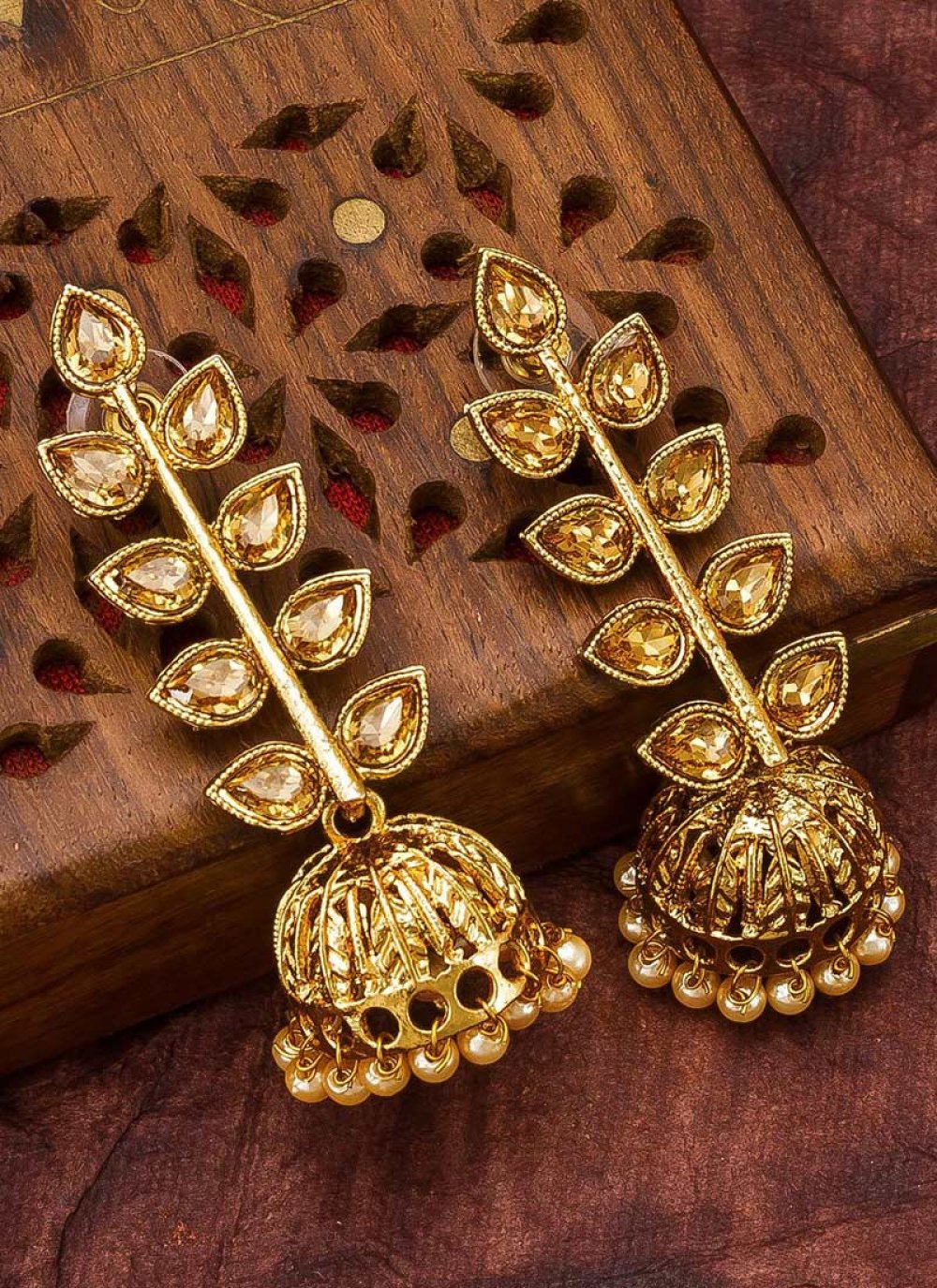 Flamboyant Stone Work Gold Rodium Polish Earrings For Festival