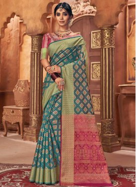 Fuchsia and Teal Woven Work Contemporary Style Saree