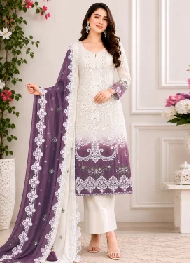 Georgette Pakistani Suit with Embroidered Work in Off White and Violet