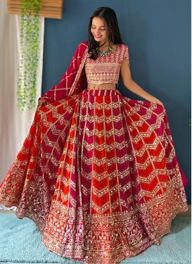 Georgette Trendy Lehenga Choli with Embroidered Work in Crimson and Orange for Festival