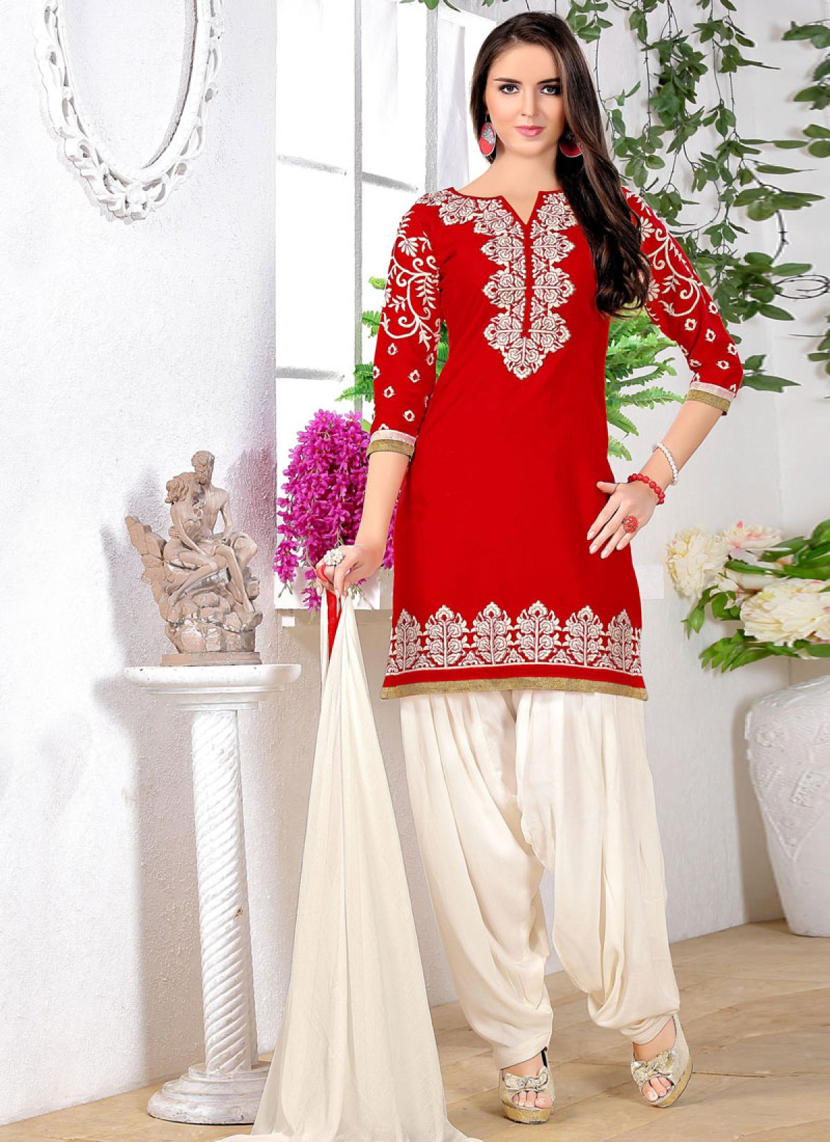 Red shops and white salwar suit