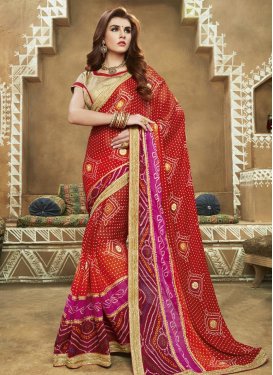 Impressive  Maroon and Red Faux Georgette Trendy Classic Saree