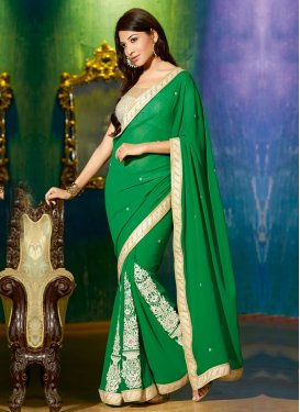 Latest Green Color Stones Work Party Wear Saree