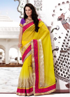 Majesty Yellow And Cream Color Party Wear Saree