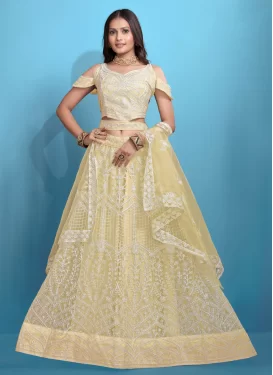 Net Designer Lehenga Choli with Embroidered Work in Cream Net Designer Lehenga Choli with Embroidered Work in Cream