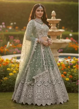 Net Designer Lehenga Choli with Embroidered Work in Sea Green