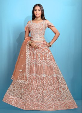 Net Trendy Lehenga Choli in Peach with Embroidered Work for Ceremonial Net Trendy Lehenga Choli in Peach with Embroidered Work for Ceremonial