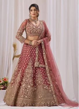 Net Trendy Lehenga Choli with Embroidered Work for Bridal in Salmon