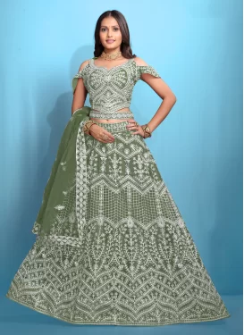 Net Trendy Lehenga Choli with Embroidered Work for Ceremonial in Green Net Trendy Lehenga Choli with Embroidered Work for Ceremonial in Green