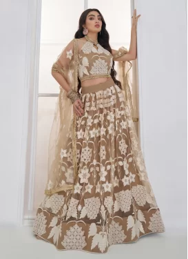 Net Trendy Lehenga Choli with Embroidered Work in Brown