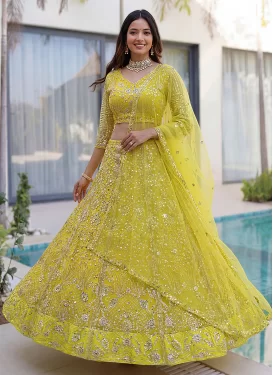 Net Trendy Lehenga Choli with Embroidered Work in Yellow