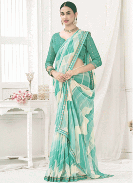 Off White and Turquoise Faux Chiffon Designer Contemporary Saree
