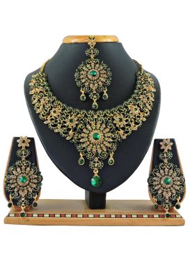Praiseworthy Bottle Green and Gold Stone Work Necklace Set For Bridal