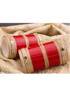 Praiseworthy Stone Work Gold and Red Bangles for Bridal