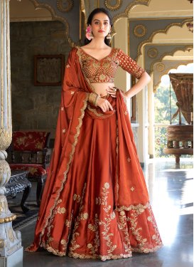 Rangoli Silk Designer Lehenga Choli with Embroidered Work in Orange for Festival