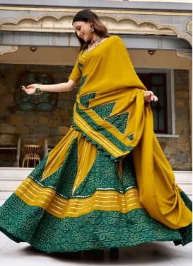 Rayon Readymade Lehenga Choli with Bandhani Print Work for Ceremonial in Green and Mustard