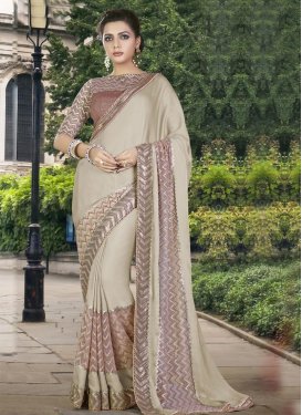 Sightly Silk Georgette Beige and Brown Lace Work Traditional Designer Saree