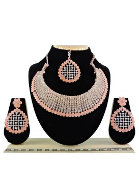 Sumptuous Gold Rodium Polish Stone Work Alloy Peach and White Necklace Set For Ceremonial