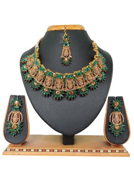 Sumptuous Stone Work Gold and Green Alloy Necklace Set