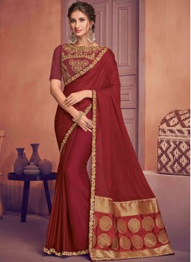 Thrilling Embroidered Maroon Designer Traditional Saree