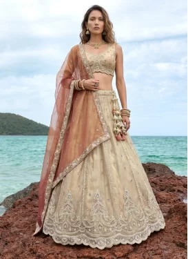 Tissue Designer Lehenga Choli with Embroidered Work in Cream