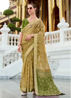 Woven Work Tissue Trendy Saree in Gold and Green for Ceremonial